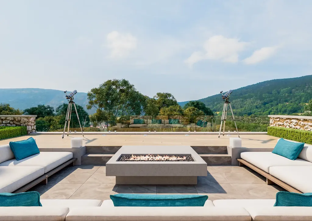 Sunken lounge with a fire pit and built in seating