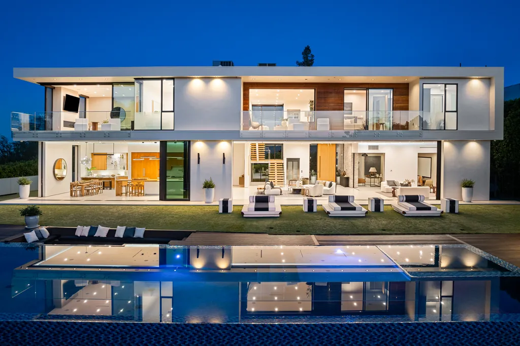 Poolside lounge of a modern villa at twilight